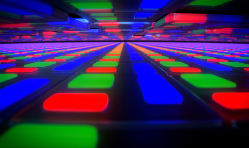 iPad Pro, front exterior, Ultra Retina XDR display illuminated with a dynamic pattern of blue, green, and red colors