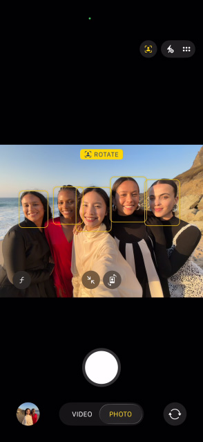 iPhone Air front screen showing group selfie in Center stage for photos feature